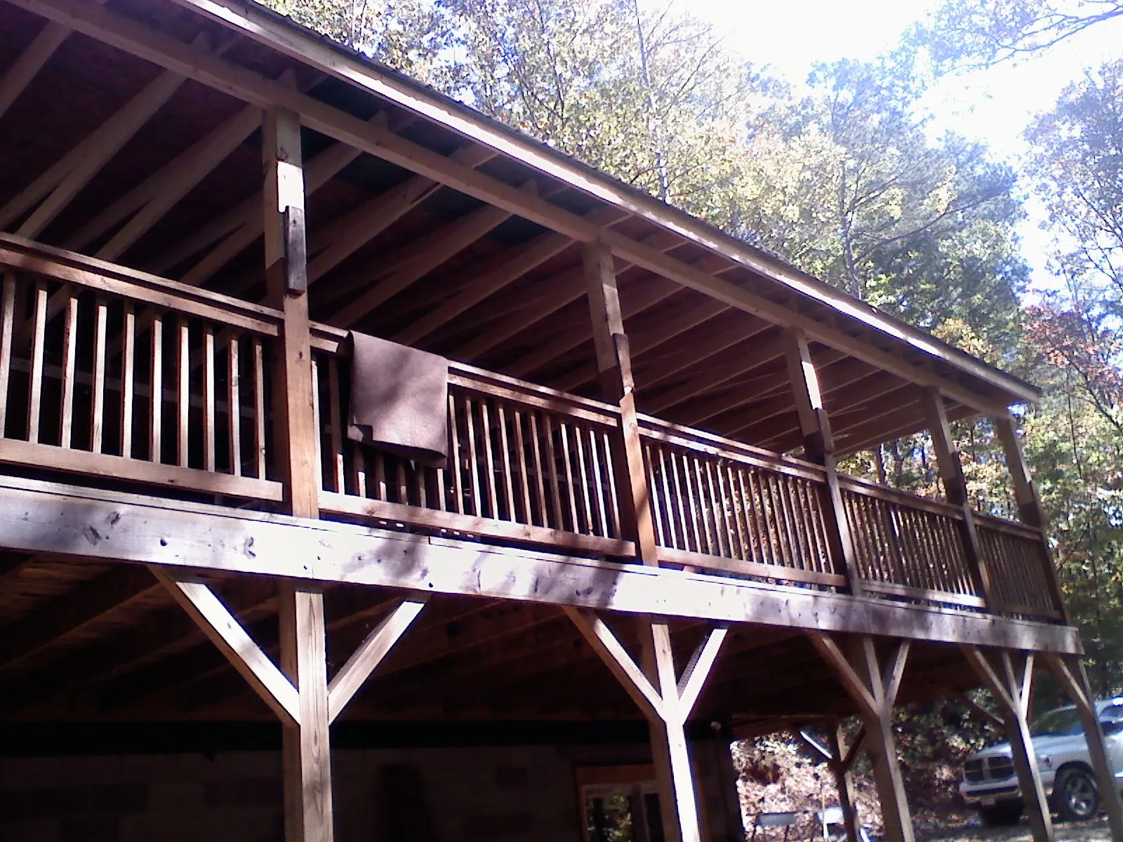 Timber framing under a new elevated porch and deck — Roof Leak Repair in South Milwaukee by Roofing Brothers